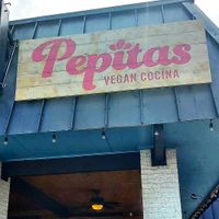 Store signage at Pepitas Vegan Taqueria in Denton