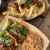 Birria tacos, and loaded fries   at Pepitas Vegan Taqueria in Denton