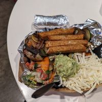 The fajita bowl. The rice and beans, under the guac, were very tasty. at Pepitas Vegan Taqueria in Denton