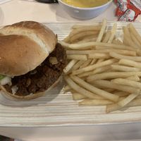 Mexican burger was spicy but good. Fries very undercooked    at Pepitas Vegan Taqueria in Denton