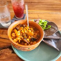 Mushroom pozole with berry lemonade  at Plantivoros in Playa Del Carmen