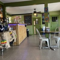 Cute inside. Just a few tables, and a sofa seating area  at HASH - Vegan Eats SA in San Antonio