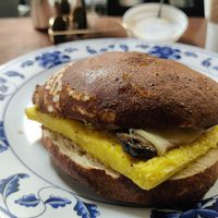 Vegan egg, cheeze and mushrooms bagel at coffee me crazy in San Antonio