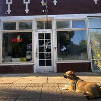 Storefront with dog  at Whittier Cafe in Denver