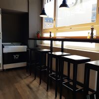 Minimal indoor seating at Dieci Pizza in Biel