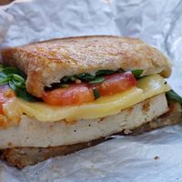 Vegan breakfast sandwich w/lemon pepper tofu ($7). Delicious and cheap. at Misfit Coffee in Minneapolis