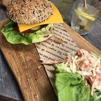 Burger plated with side salad. Honestly dont know if this was vegan, didnt finish the salad because i felt it had some kind of yoghurt at 't Boshuys in Best