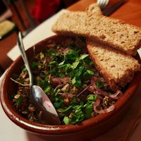 lentil rillettes, mushrooms, shallots, homemade pickles, homemade grilled focaccia at Sezono in Paris