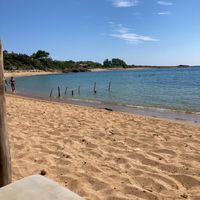 Low key beach - view from restaurant  at Spiaggia Vatsa in Kefalonia