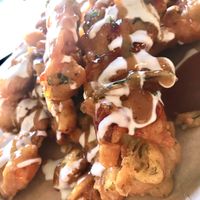 Spicy pakoras with zingy chutney at Fusca Vegan at The Neighbourhood  in Leamington Spa