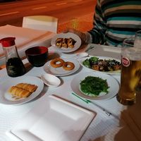 The first part of our order : Onion Rings, Wakame Salad, Vegan Gyozas, Vegan Rolls, Sautéed Shiitake Mushrooms at FU 89 in Coimbra