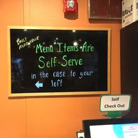 Board inside at Natures Green Grocer Cafe in Peterborough