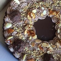 Beautiful decorations on top and 4 layers of biscuit and chocolate underneath at The Sunny Spoon in North London