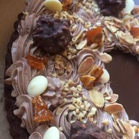 Chocolate buttons, nuts and chocolate bites on top at The Sunny Spoon in North London