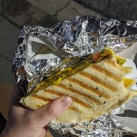 Toasted naan sandwich filled with lentils and vegetables at Bhajiya in Surry Hills