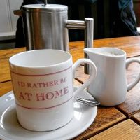 Decaf Americano with oat milk at At Home Cafe & Bistro in Grange-over-sands