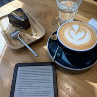 Coffee hazelnut cheesecake & oat milk latte!  at The Missing Piece in Hong Kong Island