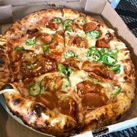 Build you own custom pizza with vegan pepperoni and jalapeños.  at Ozone's Brewhouse in Lansing