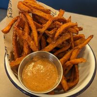 Sweet potato fries with pomegranate walnut dip. at Zameen at The Point in Santa Cruz