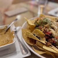 Vegan nachos with chorizo and vegan queso… so good!  at Venti's Cafe in Salem