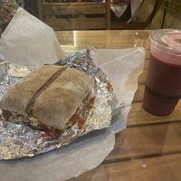 BBQ tempeh sandwich and blueberry smoothie  at Peace Cafe in Honolulu