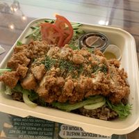 Tofu katsu plate. Comes with a tasty sprout salad (dressing was underneath the tomatoes, I didn’t realize that at first), katsu sauce and mustard are in the little cups.   at Peace Cafe in Honolulu