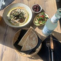 Hummus with champignons, olives and side salad  at Iss Was - Fusionsküche in Giessen