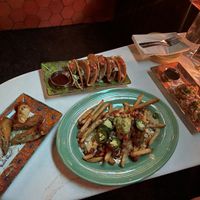 Egg rolls, dumplings, loaded fries, tacos  at Pearl Diver in Nashville