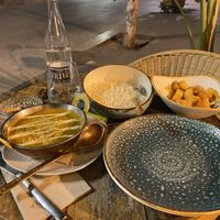 Curry w/ tofu, chickpeas & spinach. Rice. Patatas Bravas   at Cinnamon in Sitges