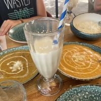 Pistacho rosa lassi + curries  at Cinnamon in Sitges