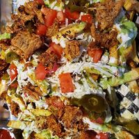 MEXHICO Loaded Fries with Barbacoa. at Mexhico Restaurant in Barrie