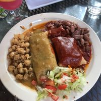 Veg tamales Xmas style with a prickly pear fruit spritzer and tostadas with guacamole and salsa! at La Choza Restaurant in Santa Fe