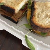 Cheddar melt mmm blistered tomatoes  at Vida's Plant Based Butcher in Columbus