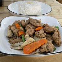 Fried pork with black pepper (25,000 kip) with steamed rice (10,000 kip).  at Veggie Lover Cafe in Vientiane
