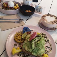 Avo toast with scrambled tofu, pancakes and hot chocolate with oat milk. at Brunch & Cake - Rosselló in Barcelona