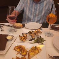 Top: "Oyster" Rockefeller, Bottom: Peach Toast at Kres Chophouse in Orlando