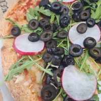 Vegan pizza at Kinoa in Malaga