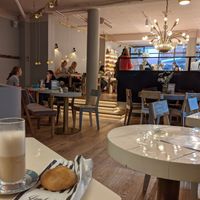 Sugar free chai tea latte with blondie bread roll and atmosphere at Isabella Glutenfrei Patisserie in Cologne