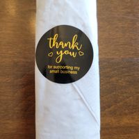 How the silverware and napkin is presented at Land of Thai in Clinton