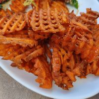 Sweet potato waffle fries, dip in the vegan nachos! at Sedona Beer Company in Sedona