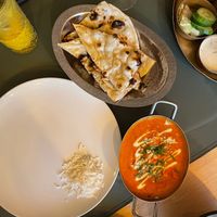 Tofu tikka masala and butter naan at Garlic n Greens in Bruges