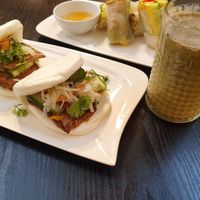 Bao buns, mango summer rolls and matcha green smoothie. at Linh - Not Just A Restaurant in Prague