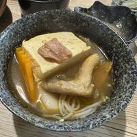 One of the many bowls of hot pot i had with noodles, tofu, mushrooms, vegan meat, carrots and more  at Linh - Not Just A Restaurant in Prague