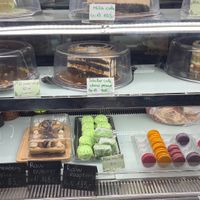 counter with deserts at Linh - Not Just A Restaurant in Prague