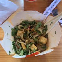 Udon noodles with red onion, tofu, shiitake and cilantro  at Wok To Walk - Damstraat in Amsterdam