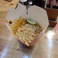 Rice noodles, sweet and sour sauce with tofu and peanuts at Wok To Walk - Damstraat in Amsterdam