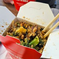 Mine: udon noodles with tofu, shiitake mushrooms, broccoli, teriyaki sauce, and peanuts.
Other: udon noodles with tofu, shiitake mushrooms, pak choi, Szechuan sauce, and sesame at Wok To Walk - Damstraat in Amsterdam