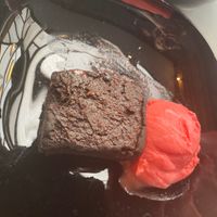 Vegan sweet potato brownie with raspberry sorbet  at The Top Pub in Brown Edge