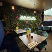 LED neon embedded in plastic flowers 💐   at Jam Delish in North London