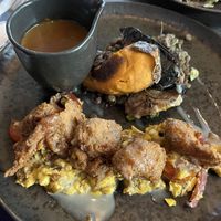 Jerk chicken with gravy  at Jam Delish in North London